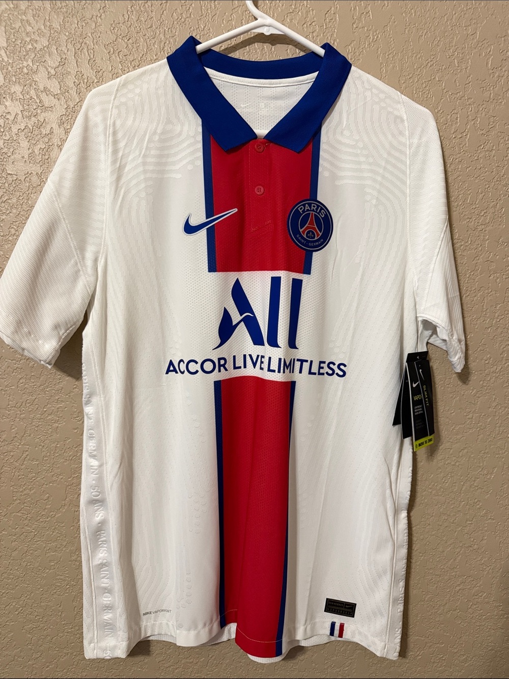 Nike White Soccer Jersey with Red & Blue Center Stripe